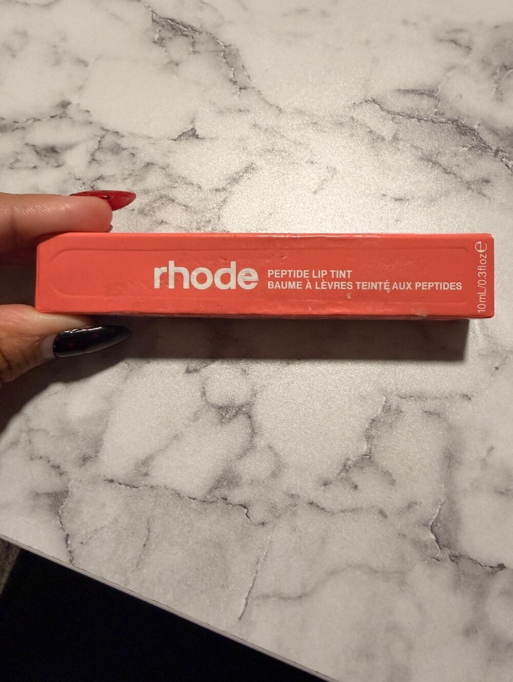 RHODE Peach Pit Tinted Lip Tint — Coral Peach